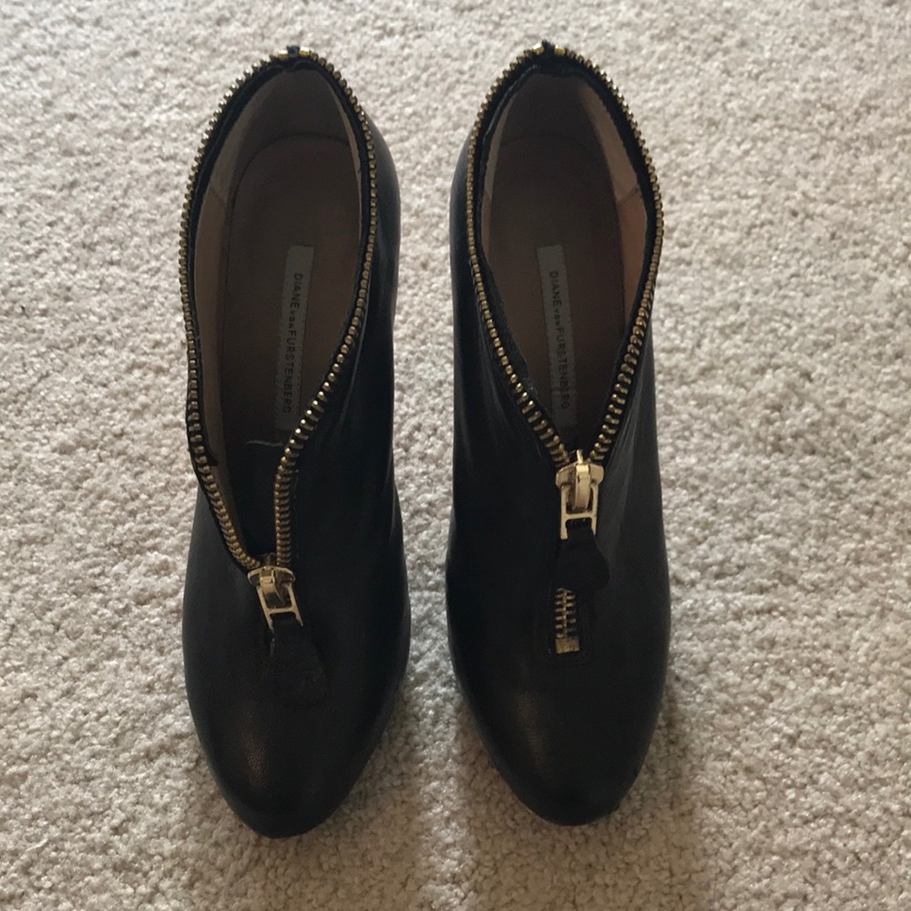 DVF Black booties with gold zipper